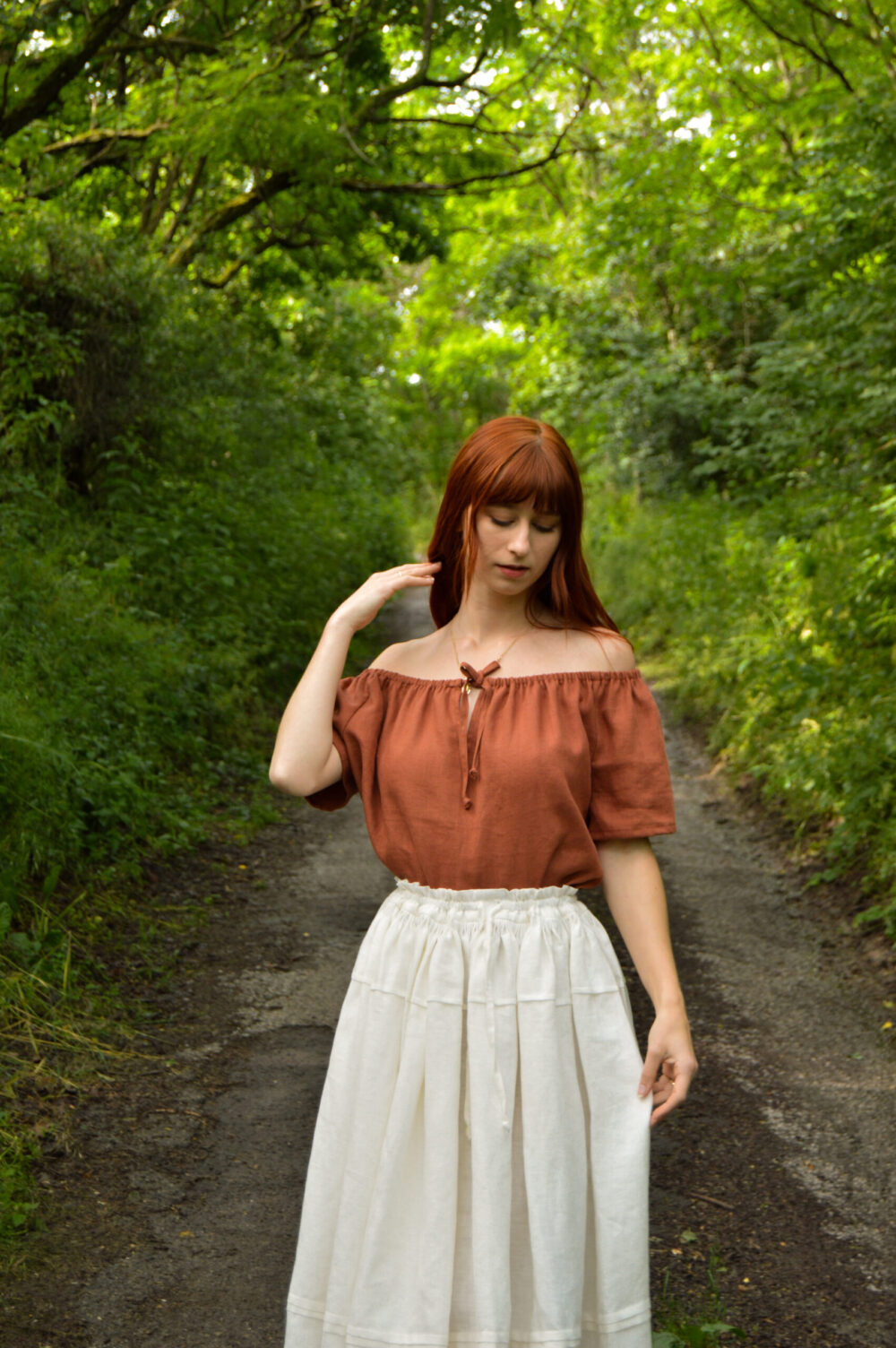 Linen chemise blouse with short sleeves in terracotta color, underskirt in ivory linen