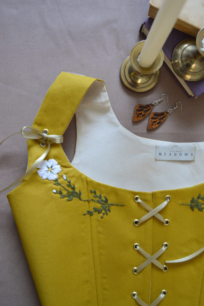 Handmade embroidered corset flower