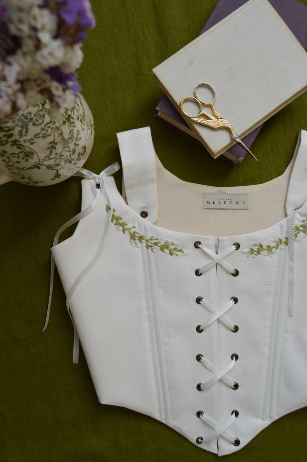 Handmade embroidered corset flower custom made