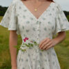 Women's cotton dress Charlotte in floral color, with a V-neckline, buttons and butterfly sleeves Women's cotton dress Charlotte in floral color, with a V-neckline, buttons and butterfly sleeves