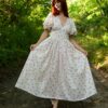 Florence dress in cotton floral pattern, with V.-neck and butterfly sleeves Florence dress in cotton floral pattern, with V.-neck and butterfly sleeves