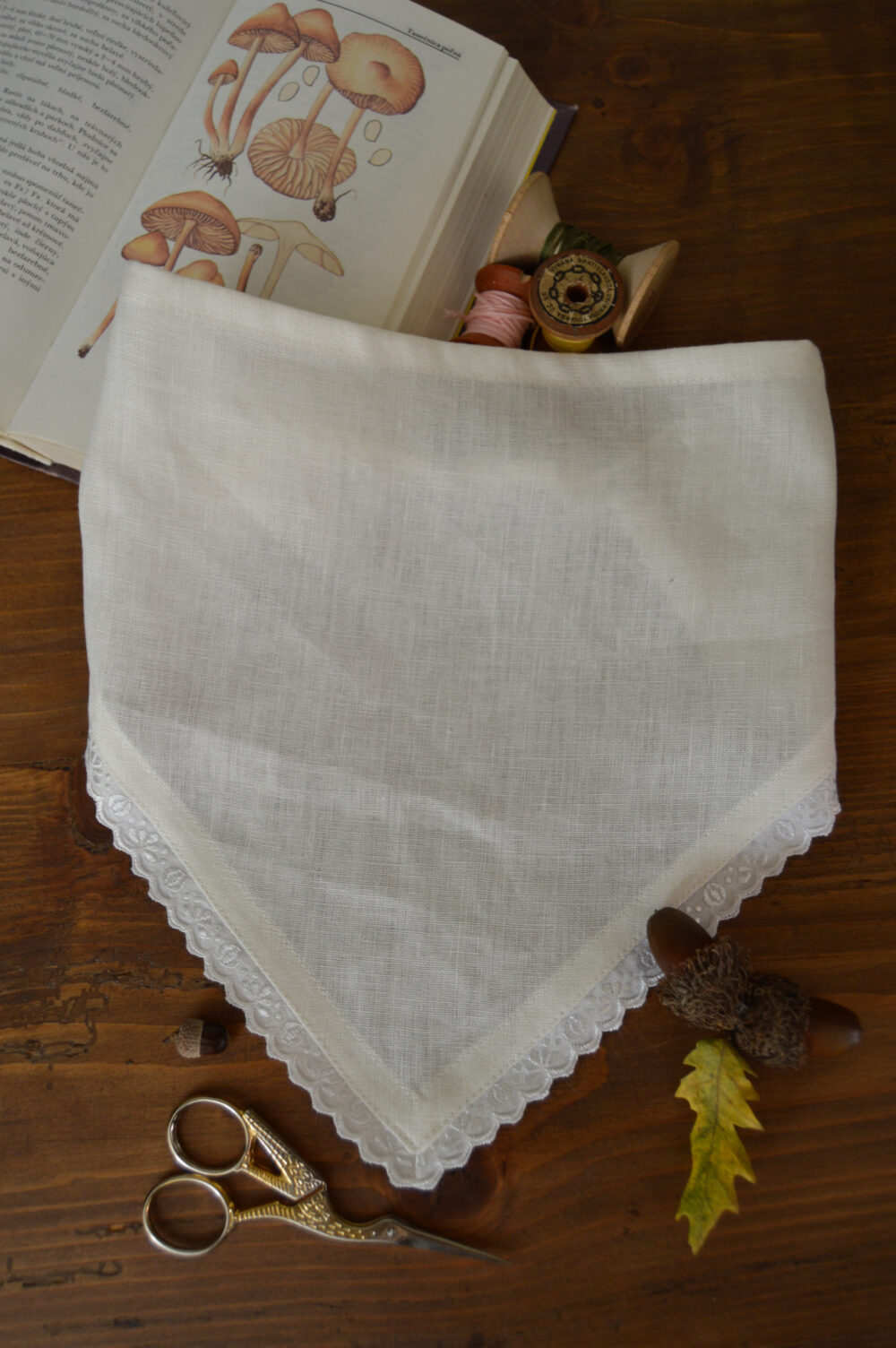 Ivory linen headscarf with a beautiful detail on the edge.
