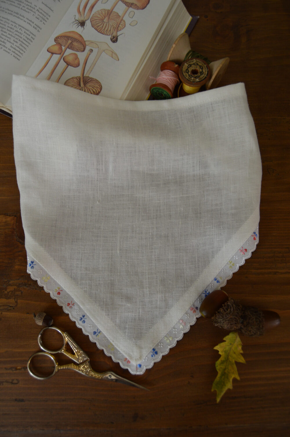 Ivory linen headscarf with a beautiful detail on the edge.